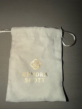 Kendra Scott Gray Drawstring Jewelry Pouch with Gold Logo
